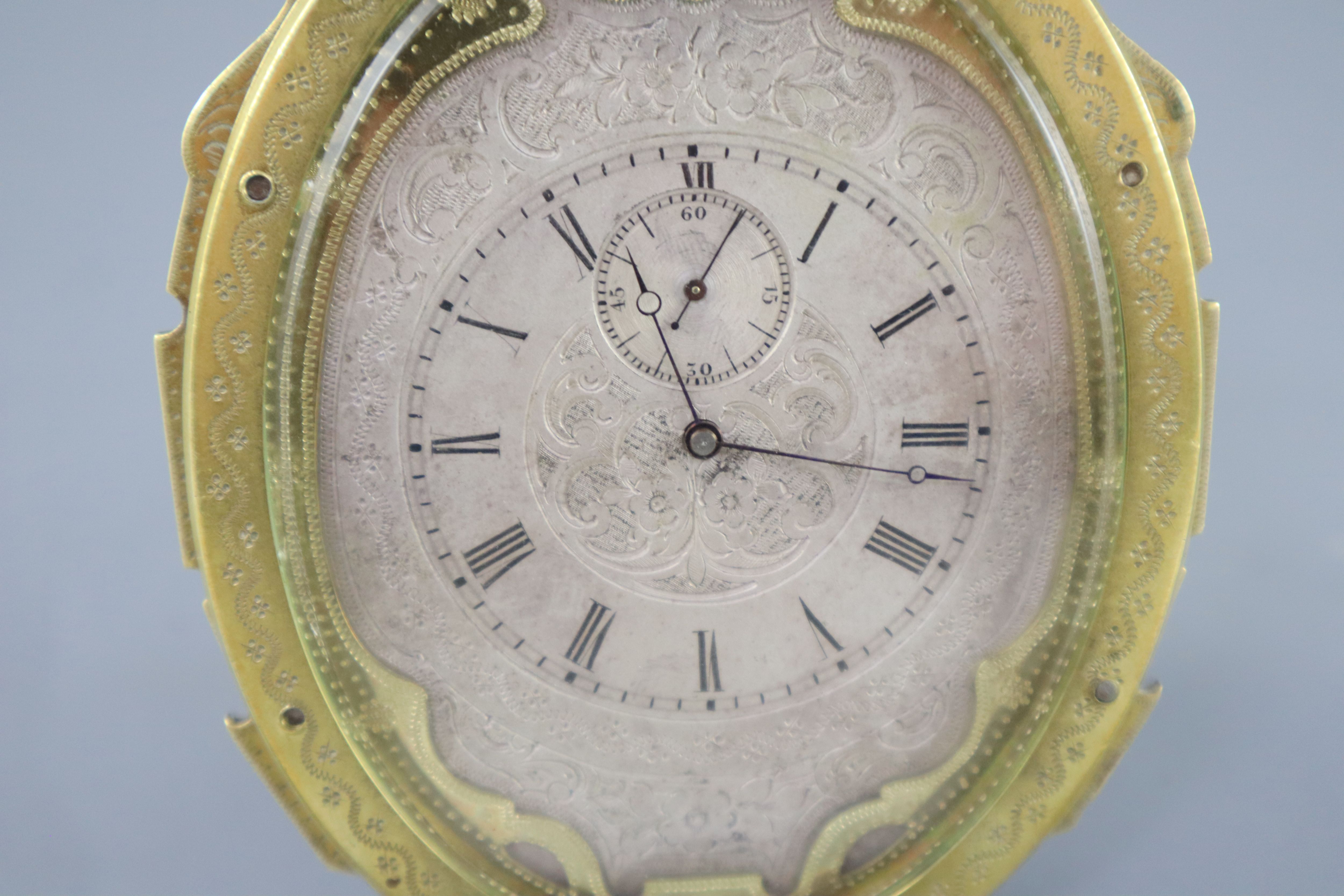 An early Victorian gilt brass strut timepiece, in the manner of Thomas Cole, height 5in.